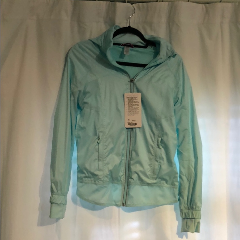 Brand new mint rain jacket.